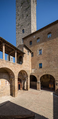 San Gimignano Italy July 2nd 2015 : Entrance and courtyard to the Musei Civici in San Gimignano, Tuscany, Italy