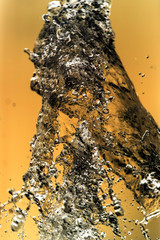 Water splashing in inversion as an abstract background