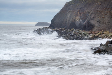 waves crashing on rocks