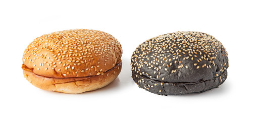 Two bun, black and white bread,  with sesame seeds isolated on white background
