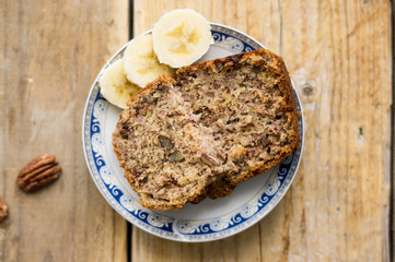 Slice of homemade banana bread on a white plate