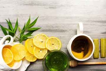 Cannabis honey with lemon tabletop view