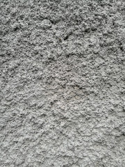 Gray plaster coat on the wall as a background