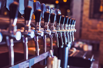 Beer taps in beer bar