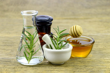 Honey, rosemary and essential oil for homeopathy remedy.