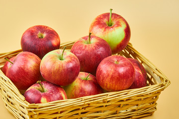 Tasty and fresh red apples in basket