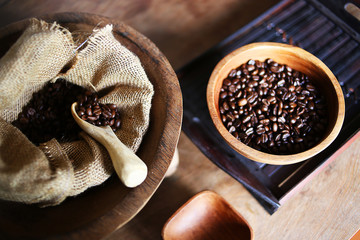 Coffee beans in a wooden Bowl