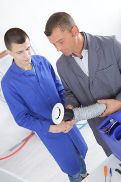 apprentice ac technician with his mentor