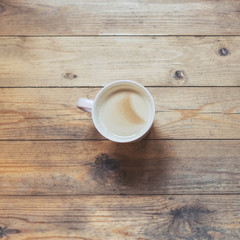 cup of coffee on a wooden table. Winter concept