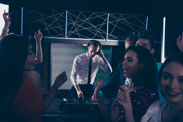 Trendy handsome serious professional DJ, gentleman, playing, mix