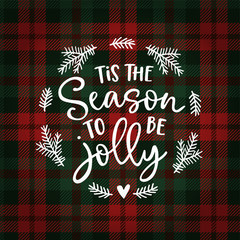 Tis the season to be jolly. Christmas greeting card, invitation with fir tree wreath. Hand lettered white text over tartan checkered plaid. Winter vector calligraphy illustration background.