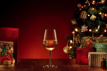 close up view of glass with white sparkling wine on color back