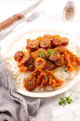 sausage with tomato sauce and rice