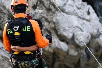Rescue training rock climbing and abseiling to help victims