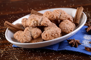 Bowl with cinnamon biscuits and anise - 