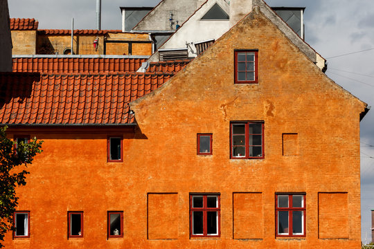 Orange House wall with windows in Christianshavn Copenhagen Denmark