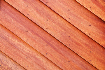 Naklejka premium Wood texture. Fragment of a wooden modern house wall