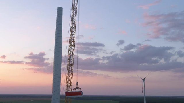 Drone aerial towerbuilding building site Windpower windmill crane GE Turbine Gondel