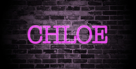 Fototapeta na wymiar first name Chloe in pink neon on brick wall