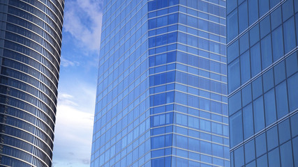 Obraz premium close up view on the modern beautiful skyscrapers with gorgeous dramatic sky on the background