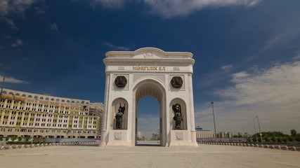 Fototapeta na wymiar triumphal arch timelapse hyperlapse and the central part of the city in Astana, Kazakhstan.
