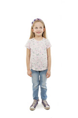 

 Portrait of a happy little girl full length. Isolated on white background