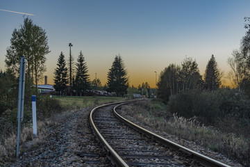 Fototapeta premium Railroad track near Zbytiny station in sunset time