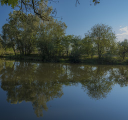 Fototapeta na wymiar Blue Malse river in autumn sunny evening