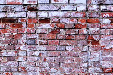 Red brick wall. Red brick. Ancient wall. Destroyed brick. Very cool brick wall texture. Construction topics. Grunge background. The effect of antiquity. Vintage background. Unique texture.