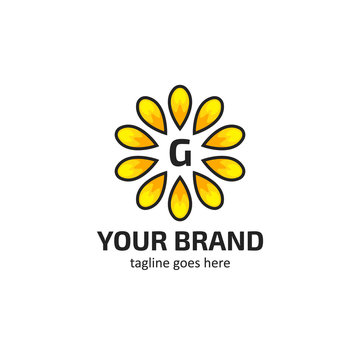 Yellow sunflower petals with letter G logo icon symbol vector