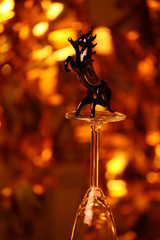 Black horse empty glass gold bokeh 