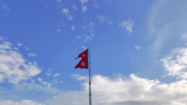 Waving flag of Nepal in slow motion, 4K 24 frame per second