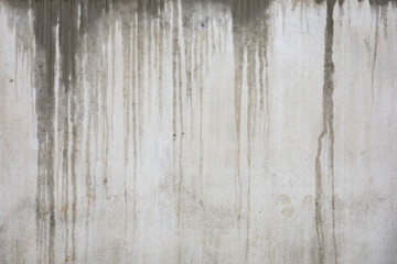 Fototapeta premium Wet concrete wall at rainy day
