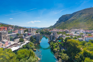  beautiful view of the old city and the historic bridge in Mostar, Bosnia and Herzegovina - obrazy, fototapety, plakaty