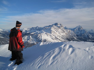 Fototapeta na wymiar Top of a snowy mountain on a sunny winter day. Swiss Alps.
