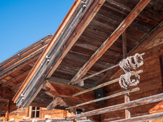 traditional beautiful wooden house on top of the mountains with a traditional architecture