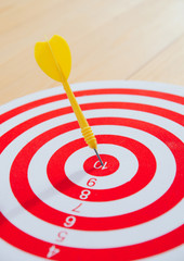 target dart pin on center 10 point dartboard  Marketing concept.