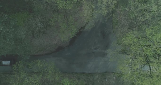 Rotating Overhead Shot of Car Making Right Turn