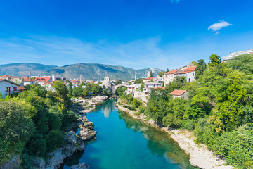 Fototapeta na wymiar Beautiful view of the old city and the historic bridge in Mostar, Bosnia and Herzegovina
