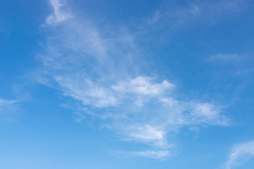 Naklejka na ściany i meble Blue sky with clouds. Heaven concept