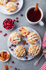 Muffins, cakes with cranberry and pecan nuts. Christmas decoration. Top view.