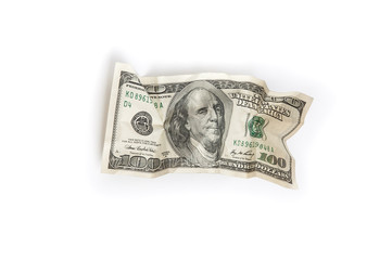 A crumpled bill of one hundred dollars on a white background is insulated.