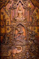Fototapeta na wymiar Wood carving of Buddhist history