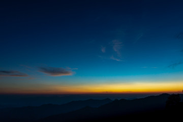 Fototapeta na wymiar Silhouettes Mountain and Sky before sunrise