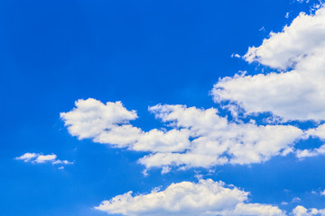 Summer blue sky with white clouds. Sunny