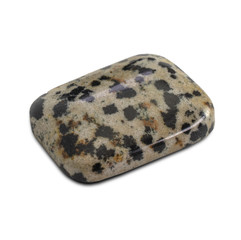 Cabochon cut dalmatian jasper stone isolated on white background