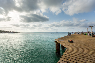 Wooden pier over blue ocean