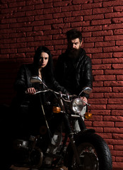 Fototapeta na wymiar biker couple. biker couple in leather jacket. sexy biker couple with motorcycle. biker couple travel on motorbike