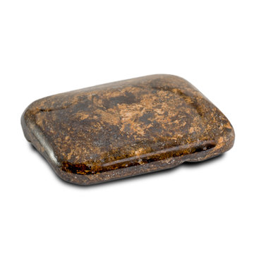 Rectangle cabochon cut bronzite stone isolated on white background