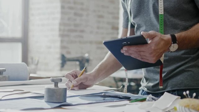Fashion designer working in his studio